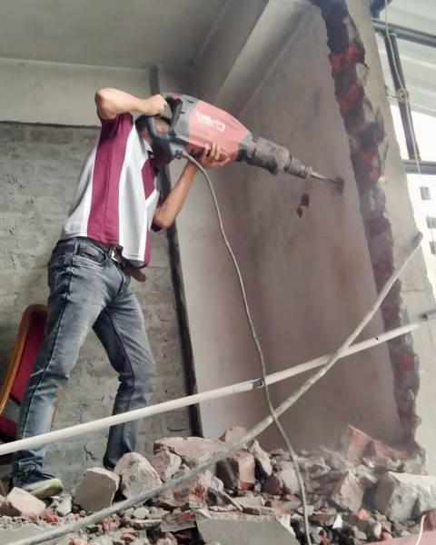 Concrete Breaking with Demolition Hammer